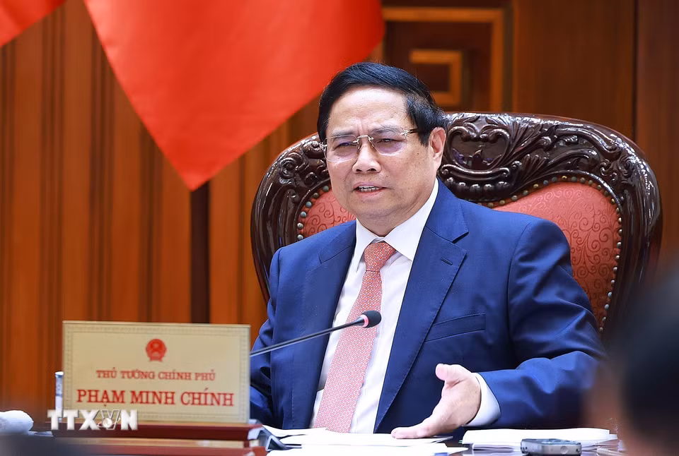 Thủ tướng Phạm Minh Chính chủ trì cuộc họp với Bộ Giáo dục và Đào tạo; Bộ Y tế. (Ảnh: Dương Giang/TTXVN)
