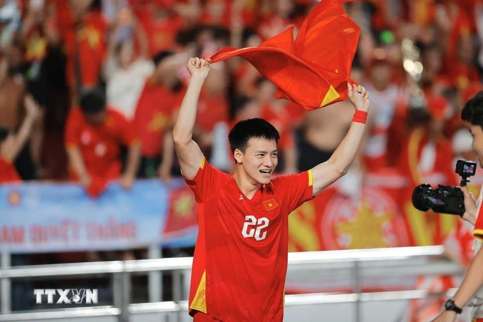 Thanh Nhàn hân hoan trong niềm vui chiến thắng. (Ảnh: Minh Quyết/TTXVN)