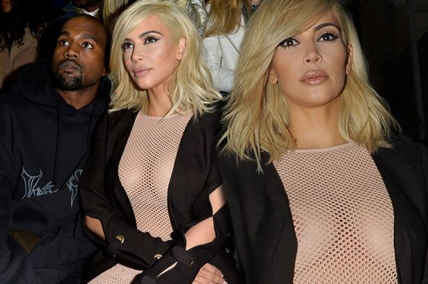 Kim Kardashian đến Paris với mái tóc vàng hoe và lộ ngực trần ảnh 1