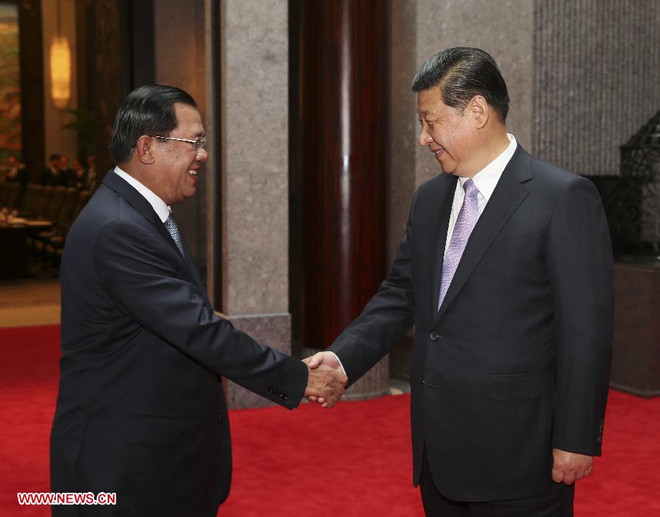 Chủ tịch Trung Quốc Tập Cận Bình tiếp Thủ tướng Campuchia Hun Sen (Nguồn: Xinhua) Trung Quốc tiếp tục hỗ trợ tài chính cho Campuchia ảnh 1