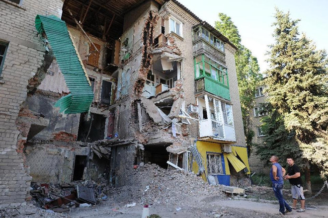 Ukraine: Đạn pháo rơi vào nhà thờ và bệnh viện, gây thương vong ảnh 1