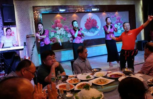 Ban nhạc nữ Triều Tiên khuấy đảo biên giới Trung Quốc ảnh 2