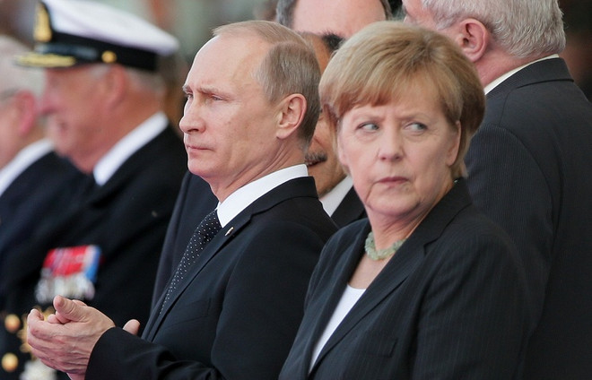 Tổng thống Nga Vladimir Putin và Thủ tướng Đức Angela Merkel có mối quan tâm chung về Ukraine (Nguồn: TASS) Vấn đề Biển Đông, Ukraine sẽ được đề cập tại Hội nghị ASEM 10 ảnh 1