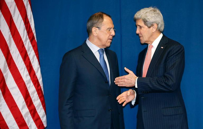 Ngoại trưởng Sergei Lavrov và người đồng cấp Mỹ John Kerry trong một lần hội đàm về tình hình Ukraine Lavrov: Sự nguội lạnh trong quan hệ Nga-Mỹ sẽ kéo dài ảnh 1
