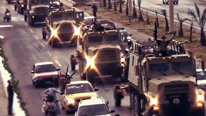 Sốc và hoảng sợ: ISIS phát tán video hành quyết tập thể ở Iraq ảnh 1