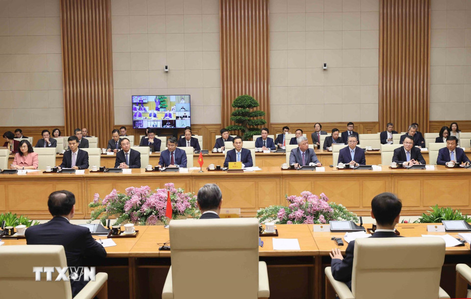 Phó Thủ tướng Bùi Thanh Sơn và đoàn đại biểu Việt Nam tại phiên họp. (Ảnh: An Đăng/TTXVN)