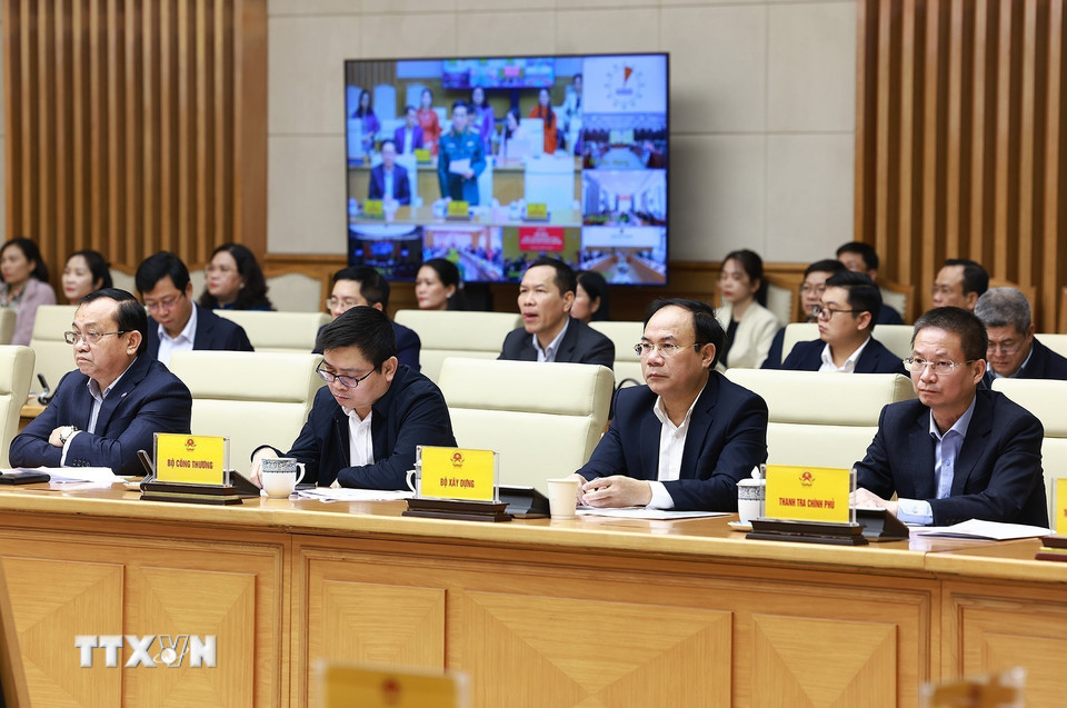 Các đại biểu tham dự Hội nghị tổng kết “Chiến dịch Quang Trung” xây dựng lại nhà cho các gia đình bị thiệt hại do bão lũ tại miền Trung. (Ảnh: Dương Giang/TTXVN)