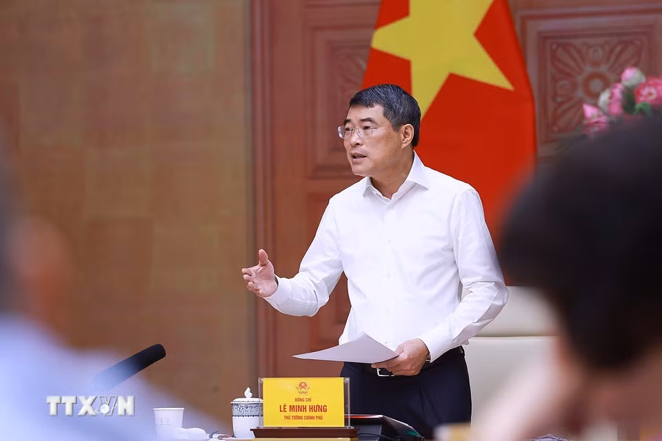 Thủ tướng Lê Minh Hưng chủ trì làm việc với lãnh đạo Bộ Tư pháp. (Ảnh: Dương Giang/TTXVN)