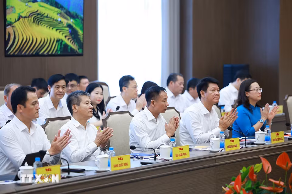 Các đại biểu tỉnh Lào Cai tham dự buổi làm việc. (Ảnh: Dương Giang/TTXVN)