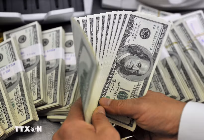 Đồng USD. (Ảnh: AFP/TTXVN)