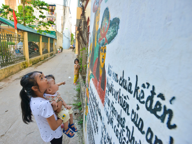 Khám phá những bích họa có một không hai trong con ngõ nhỏ Hà Nội ảnh 13