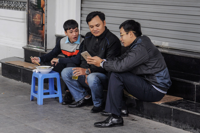 [Photo] Thủ đô Hà Nội se sắt trong cái lạnh đầu Đông ảnh 13