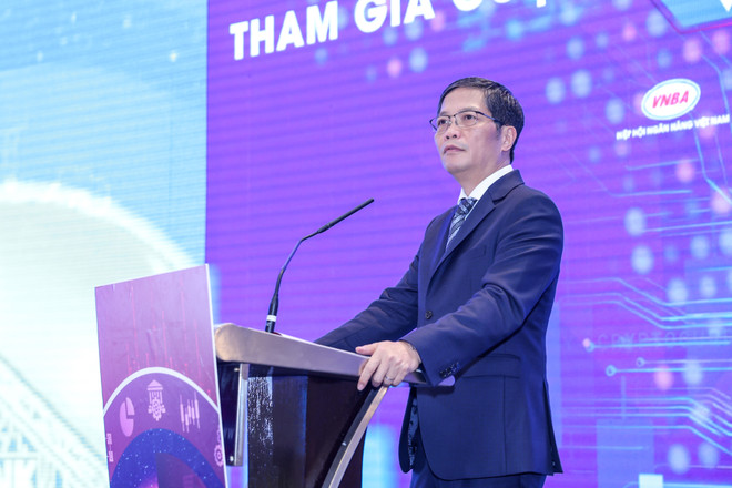 Ông Trần Tuấn Anh - Trưởng ban Kinh tế Trung ương phát biểu khai mạc Diễn đàn. (Ảnh: Minh Sơn/Vietnam+) Chuyển đổi số ngân hàng: Lấy trải nghiệm của người dùng là thước đo ảnh 2