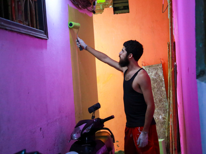 Chàng trai Mỹ mải miết nhuộm lại màu cho phố cổ Hà Nội ảnh 5