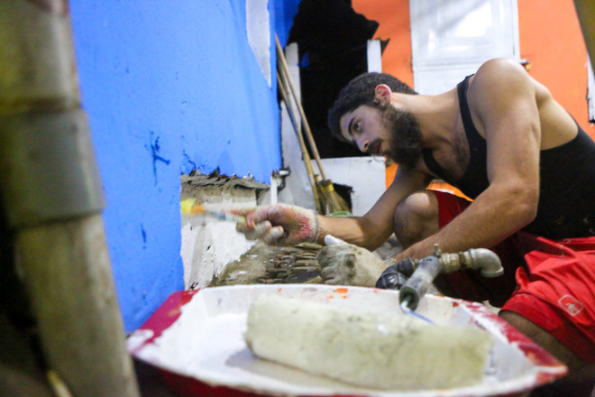 Chàng trai Mỹ mải miết nhuộm lại màu cho phố cổ Hà Nội ảnh 2