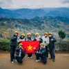 Giới trẻ trên hành trình khám phá điểm đến Hà Giang. (Ảnh: Vương Công Nam/Vietnam+)