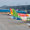 Máy bay của các Hãng hàng không Việt Nam tại Sân bay Quốc tế Nội Bài. (Ảnh: PV/Vietnam+)