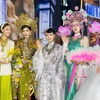 NTK Thanh Hương Bùi (giữa) ấn tượng với cổ phục khi ngồi "ghế nóng" Miss Grand Vietnam 2025. (Ảnh: BTC)