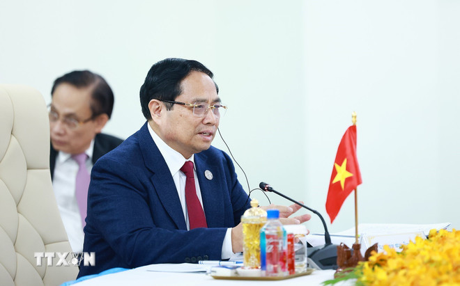 ttxvn-cuoc-gap-giua-thu-tuong-ba-nuoc-viet-nam-lao-campuchia-8577700-6.jpg