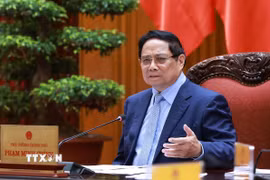 Thủ tướng Phạm Minh Chính chủ trì cuộc họp về triển khai đẩy nhanh tiến độ thực hiện các dự án đường sắt kết nối Việt-Trung. (Ảnh: Dương Giang/TTXVN)