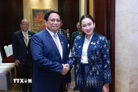 Trong chuyến tham dự Hội nghị Cấp cao ASEAN lần thứ 44, 45 và các hội nghị cấp cao liên quan tại Vientiane (Lào), tối 9/10/2024, Thủ tướng Phạm Minh Chính gặp Thủ tướng Thái Lan Paetongtarn Shinawatra. Ảnh: Dương (Giang/TTXVN)