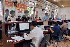 Trung tâm Phục vụ hành chính công xã Tủa Sín Chải, tỉnh Lai Châu, nhanh chóng trở thành địa chỉ quen thuộc, gần gũi của người dân trên địa bàn mỗi khi cần giải quyết các thủ tục hành chính. (Ảnh: Việt Dũng/TTXVN)