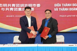 Lễ ký kết Biên bản ghi nhớ hợp tác giữa Thành Đoàn Thành phố Hồ Chí Minh với Thành Đoàn thành phố Trùng Khánh, Trung Quốc. (Ảnh: Trung Tuyến/TTXVN)