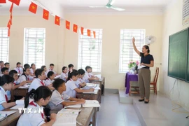 Giờ học tại trường Trung học Cơ sở Thị trấn 2, xã Vạn An (Nghệ An). (Ảnh: Bích Huệ/TTXVN)