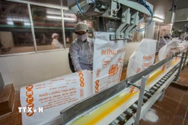 Dây chuyền đóng bao sản phẩm đường tinh luyện (RE). (Ảnh: Trọng Đạt/TTXVN)