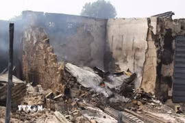 Hiện trường một vụ tấn công tại Nigeria. (Ảnh: AFP/TTXVN)