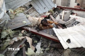 Nạn nhân bị thương sau một cuộc không kích tại Saada, Yemen, ngày 28/4/2025. (Ảnh: THX/TTXVN)