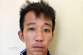 Đối tượng Cái Tô Gia Luật tại cơ quan Công an. (Ảnh: TTXVN phát)