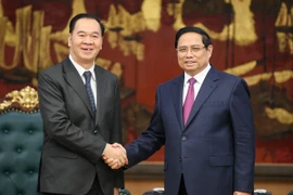Thủ tướng Phạm Minh Chính tiếp ông Thongsalith Mangnormek, Bí thư Trung ương Đảng, Bộ trưởng Bộ Giáo dục và Thể thao Lào. (Nguồn: Báo Chính phủ)