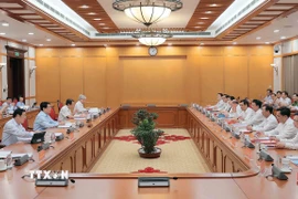 Ủy viên Bộ Chính trị, Chủ tịch nước Lương Cường chủ trì buổi làm việc. (Ảnh: An Đăng/TTXVN)