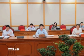 Ủy viên Bộ Chính trị, Chủ tịch nước Lương Cường chủ trì buổi làm việc. (Ảnh: An Đăng/TTXVN)