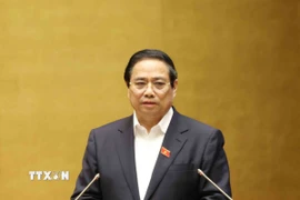 Thủ tướng Phạm Minh Chính trình bày Chuyên đề 1 "Nội dung trọng tâm, cốt lõi của Nghị quyết số 68-NQ/TW, ngày 4/5/2025 của Bộ Chính trị về phát triển kinh tế tư nhân và Kế hoạch hành động thực hiện Nghị quyết." (Ảnh: Phương Hoa/TTXVN)