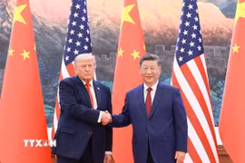 Chủ tịch Trung Quốc Tập Cận Bình và Tổng thống Mỹ Donald Trump tại cuộc hội đàm ở Bắc Kinh. (Ảnh: THX/TTXVN)