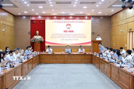 Hội nghị đánh giá kết quả triển khai Nghị quyết số 57-NQ/TW của Bộ Chính trị trong công tác 6 tháng đầu năm. (Ảnh: Minh Đức/TTXVN)