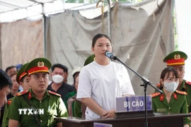 Bị cáo Bùi Hồng Nhi tại phiên tòa. (Ảnh: Huỳnh Anh/TTXVN)