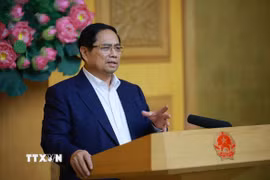 Thủ tướng Phạm Minh Chính họp đẩy nhanh tiến độ triển khai xây dựng lại, sửa chữa nhà ở cho các gia đình bị thiệt hại do các đợt thiên tai tại miền Trung. (Ảnh: Dương Giang/TTXVN)