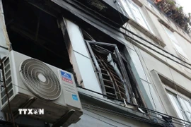 Vụ cháy tại ngôi nhà 3 tầng ở số 87a ngách 99/110/85 Định Công Hạ (Hoàng Mai, Hà Nội) khiến 4 người thương vong. (Ảnh: Hoàng Hiếu/TTXVN)