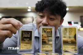 Giá vàng châu Á lập kỷ lục mới trong phiên sáng 26/12. (Ảnh: Yonhap/TTXVN)