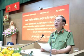 Thượng tướng Trần Quốc Tỏ, Ủy viên Trung ương Đảng, Thứ trưởng Bộ Công an, phát biểu tại một buổi hội thảo. (Ảnh: Phạm Kiên/TTXVN)