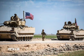 Binh sỹ Mỹ tuần tra tại Qamishli, tỉnh Hasakeh, Đông Bắc Syria. (Ảnh: AFP/TTXVN)