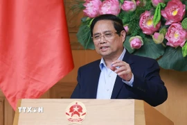 Thủ tướng Phạm Minh Chính chủ trì họp đánh giá sơ kết 1 tháng vận hành chính quyền địa phương hai cấp. (Ảnh: Dương Giang/TTXVN)