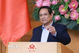 Thủ tướng Phạm Minh Chính chủ trì họp đánh giá sơ kết 1 tháng vận hành chính quyền địa phương hai cấp. (Ảnh: Dương Giang/TTXVN)