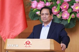 Thủ tướng Phạm Minh Chính chủ trì họp đánh giá sơ kết 1 tháng vận hành chính quyền địa phương hai cấp. (Ảnh: Dương Giang/TTXVN)