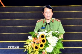 Đại tướng Lương Tam Quang, Ủy viên Bộ Chính trị, Bộ trưởng Bộ Công an phát biểu. (Ảnh: TTXVN phát)