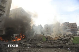 Hiện trường đổ nát sau khi Israel không kích phía Nam ngoại ô Beirut, Liban ngày 28/3. (Ảnh: THX/TTXVN)