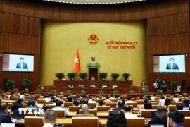 Chủ tịch nước Lương Cường trình bày Báo cáo tổng kết công tác nhiệm kỳ 2021-2026 của Chủ tịch nước. (Ảnh: Phạm Kiên/TTXVN)